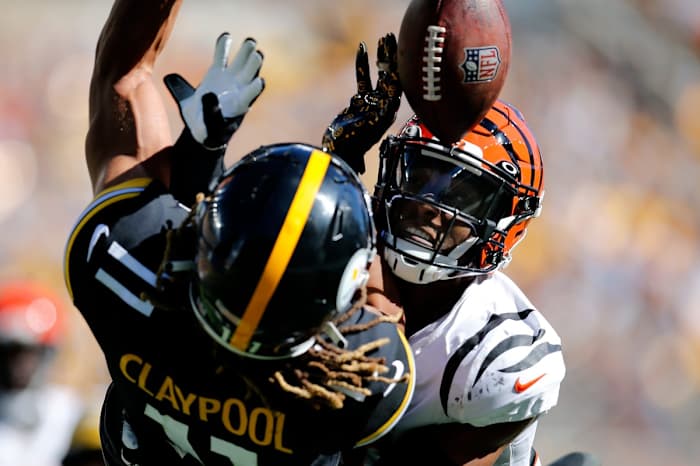 Cincinnati Bengals cornerback Eli Apple (20) breaks up a pass intended for Pittsburgh Steelers wide receiver Chase Claypool (11) in the fourth quarter of the NFL Week 3 game between the Pittsburgh Steelers and the Cincinnati Bengals at Heinz Field in Pittsburgh on Sunday, Sept. 26, 2021. The Bengals held on to a halftime lead for a 24-10 win in Pittsburgh.

Cincinnati Bengals At Pittsburgh Steelers